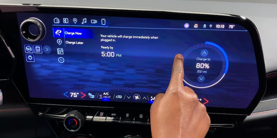 Person Interacting with Blazer EV Display Screen to View Target Charge Level