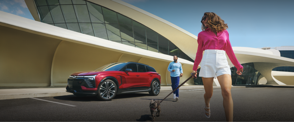 Couple Walking Away From Their Chevy Blazer EV