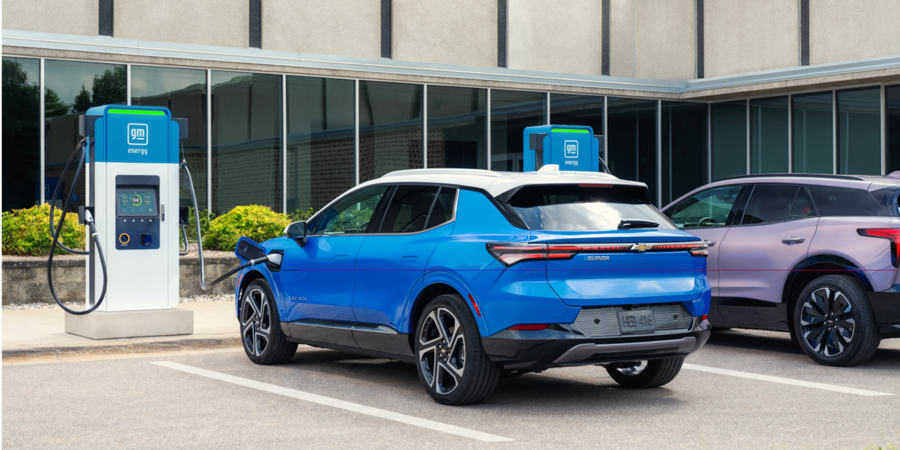 Chevrolet Equinox EV at Outfoor Charging Station 3/4 Back View