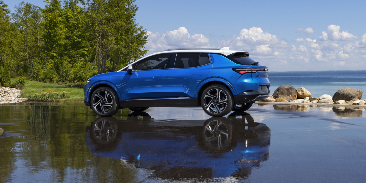  2024 Chevy Equinox EV Profile View Parked by a Lake