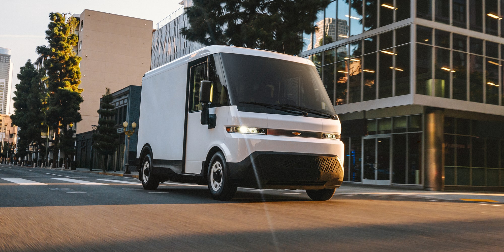 Chevy BrigthDrop Van Driving On City Street