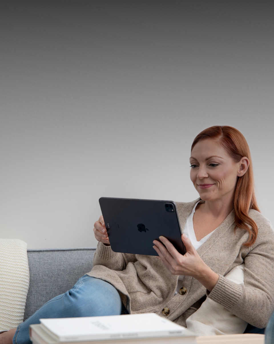 Woman viewing MyWay content on tablet