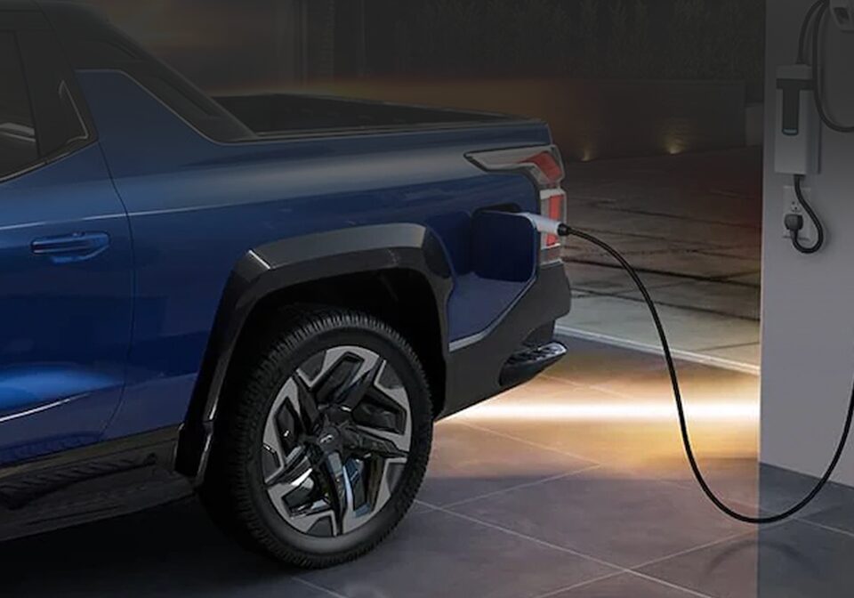 The Silverado EV Plugged into a Charger 