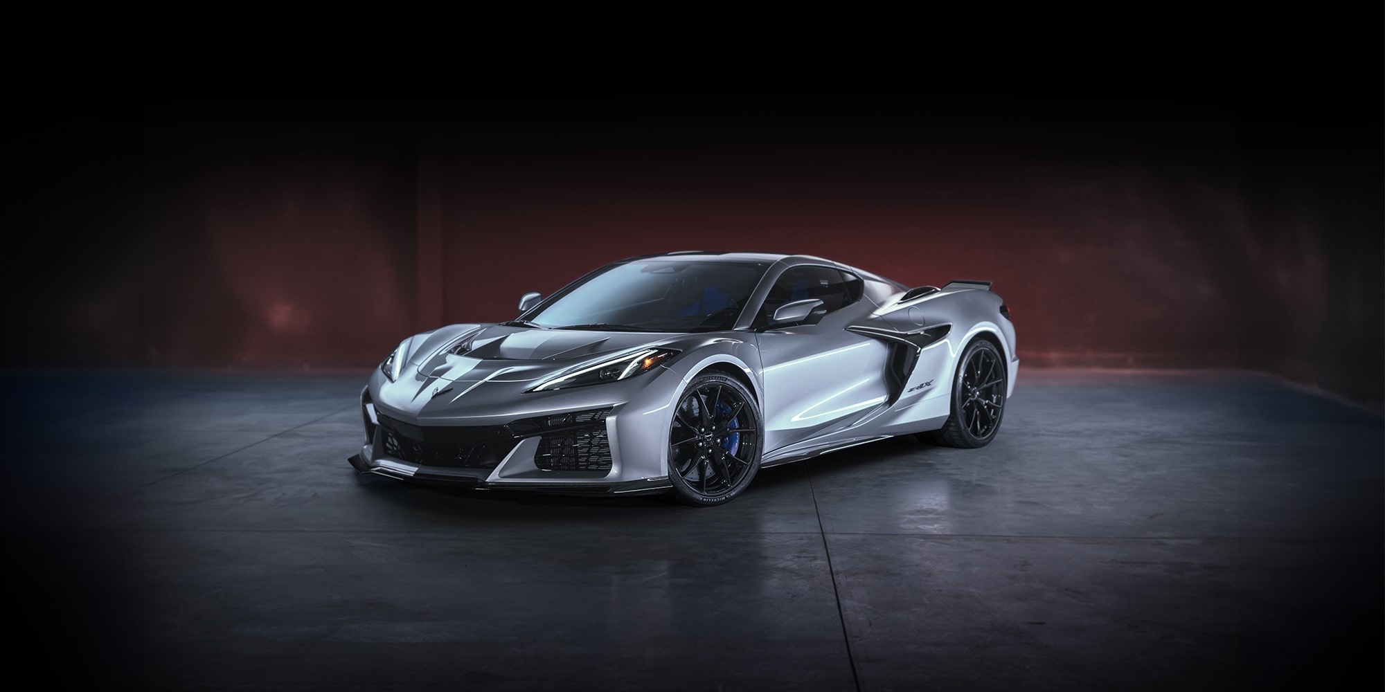 2026 Chevy Corvette ZR1X Racing Around a Bend on a Racetrack