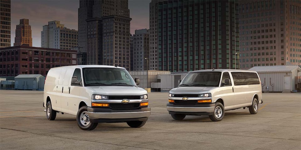 2023 Chevy Express Vans Parked in the City Center