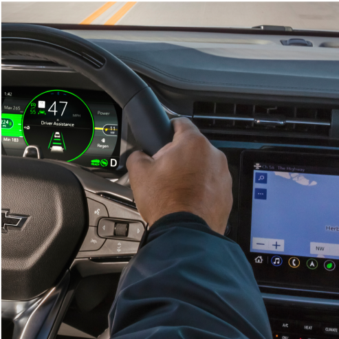 Driver's Hands on Stering Wheel of 2023 Bolt EUV with Navigation Displayed