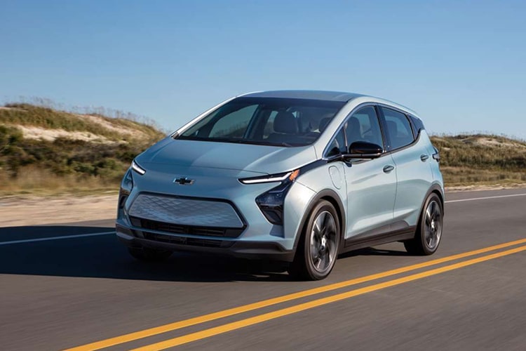 Front 3/4 Shot of 2023 Bolt EV Driving on Country Road