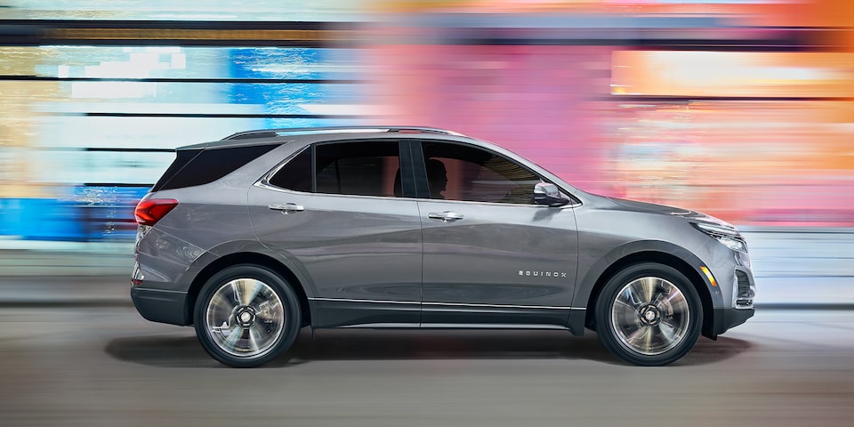 The Iron Grey Metallic 2023 Chevy Equinox Driving Quickly through a Tunnel