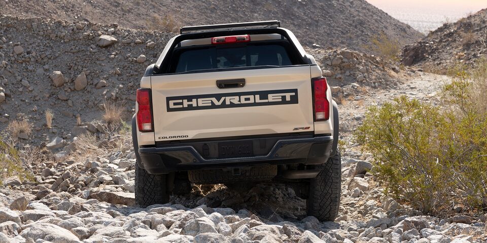 The 2023 Empire Beige Metallic Chevy Colorado Taking on a Rocky Off-Road Terrain With Ease 