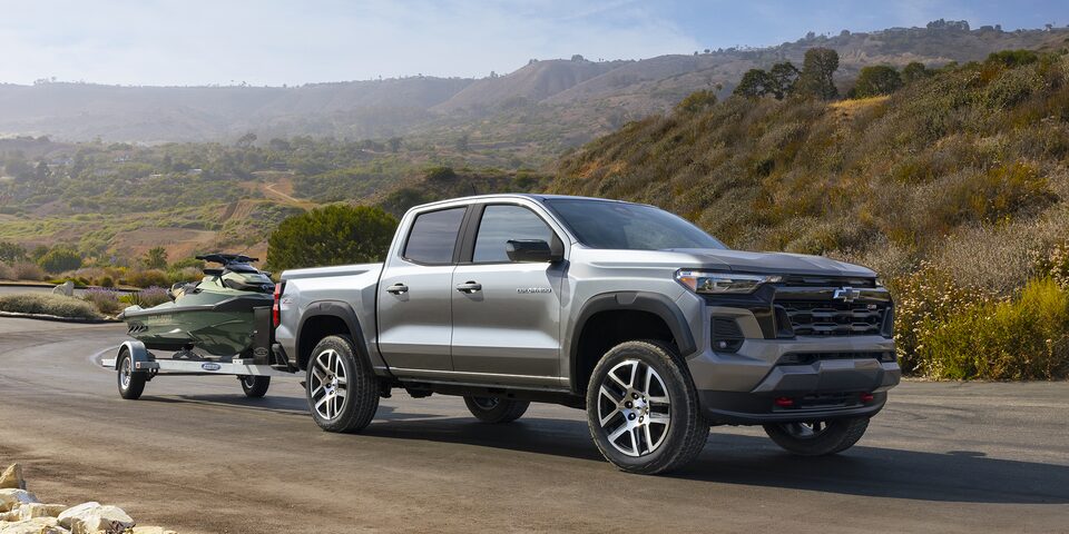 The 2023 Satin Steel Metallic Chevy Colorado Tows a Jet Ski While Taking the Scenic Route