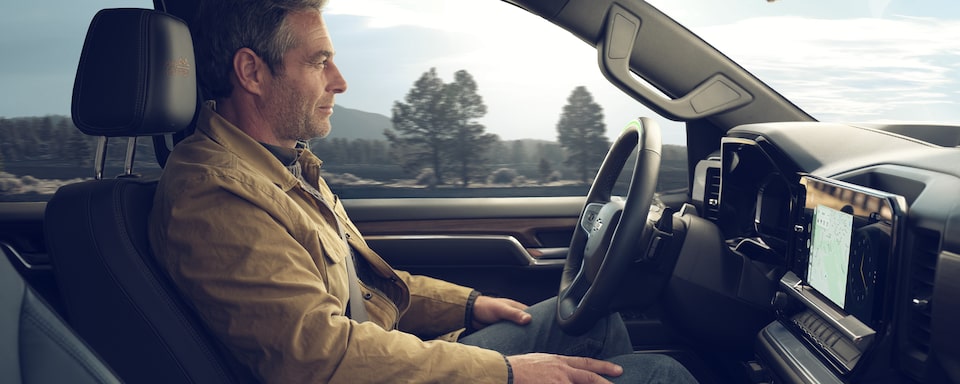 A Man enjoying the Supercruise Technology of his 2023 Silverado