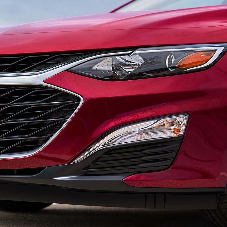 Close-Up Of Front Exterior Head Lamp On The 2024 Chevy Mal
