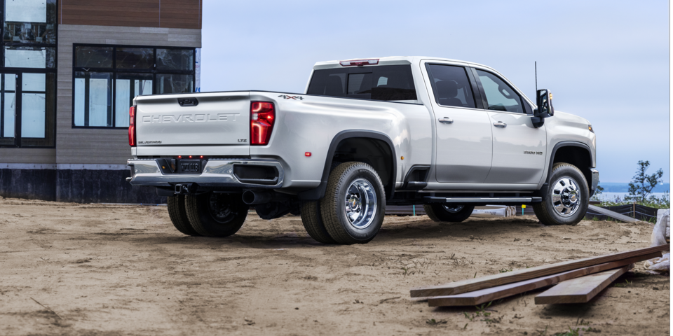 White Silverado HD Commercial Truck Parked at Home Construction Site
