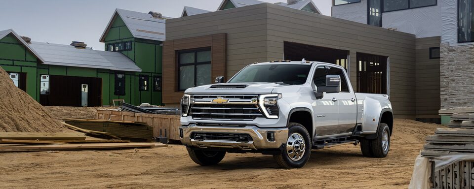 The 2024 Summit White Silverado HD Parked
