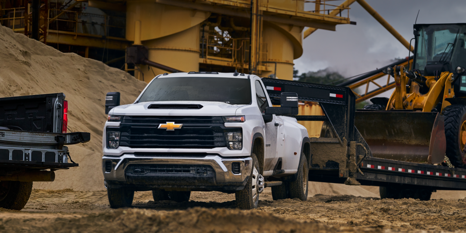 The 2024 Summit White Silverado HD Parked