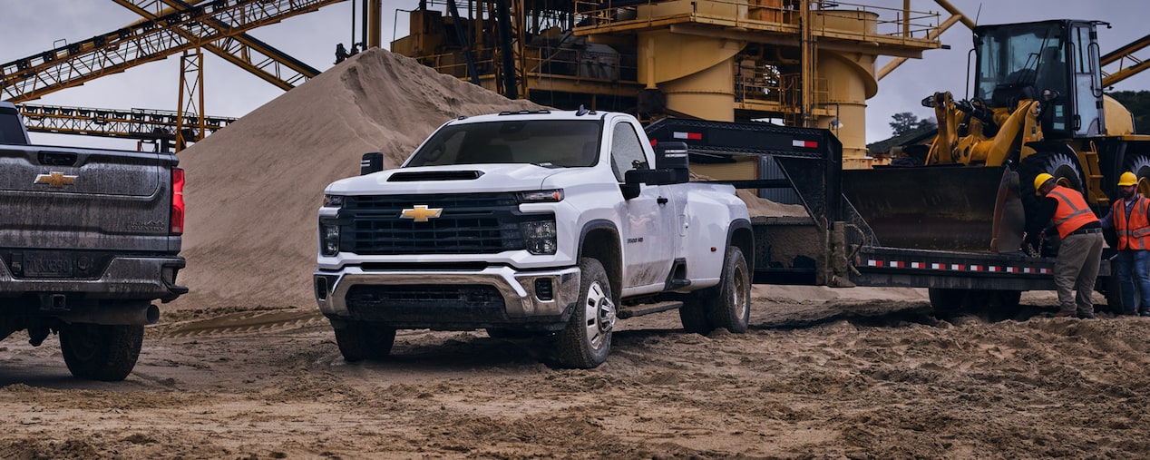 The 2024 Summit White Silverado HD Parked