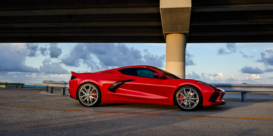 Torch Red 2024 Chevy Corvette Stingray Side Profile Parked Under Highway Bridge