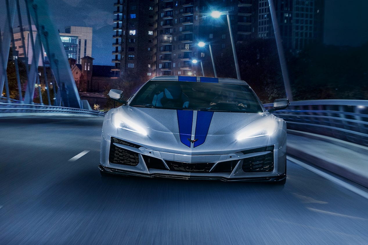 2024 Chevrolet Corvette E-Ray Head-On Driving on City Bridge At Night With Lights On