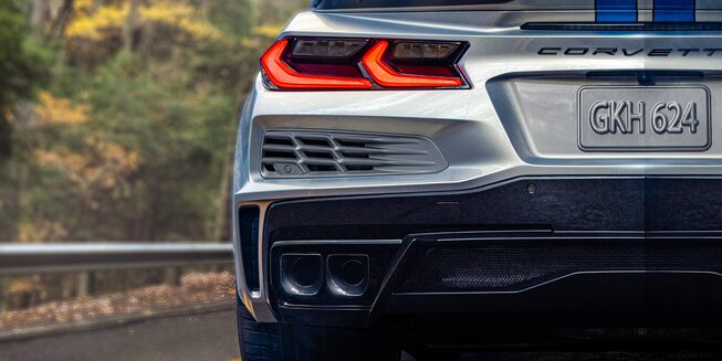 The Imposing Rear-End Design of the Corvette E-Ray with a Mountain Backdrop