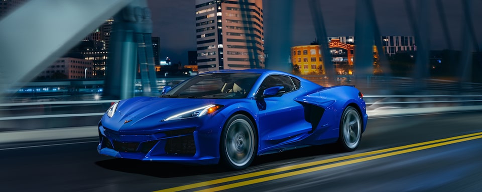 The Corvette E-Ray Driving on a Bridge in the City Center 