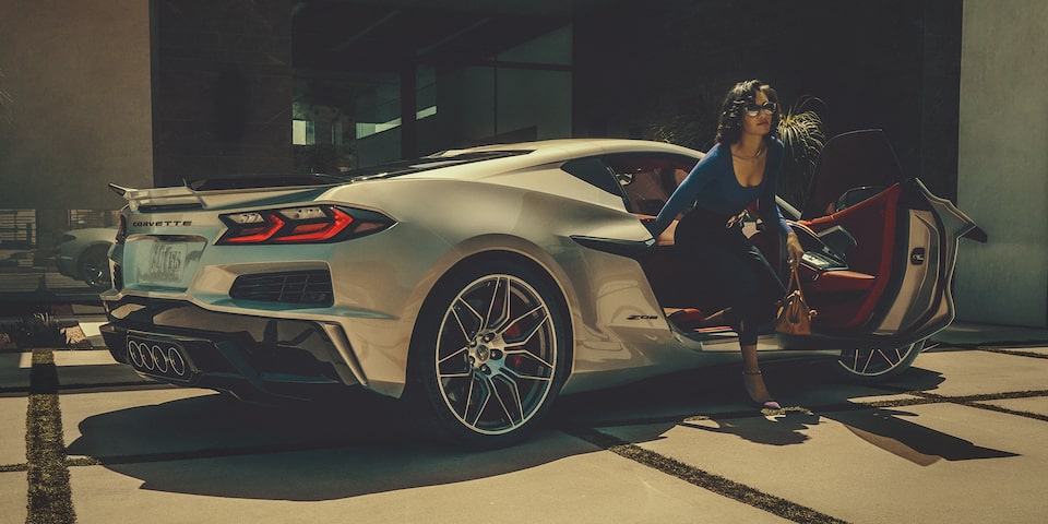 A Woman Exits the Passenger Side of the Corvette Z06