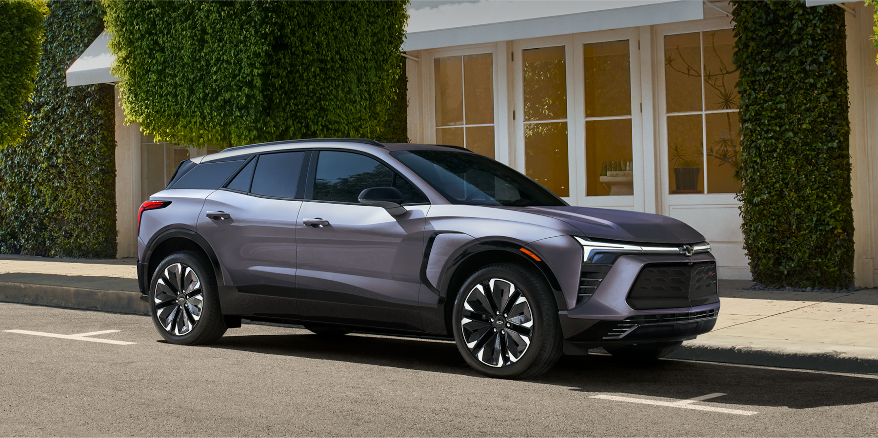 Grey Chevy 2024 Blazer EV parallel parked
