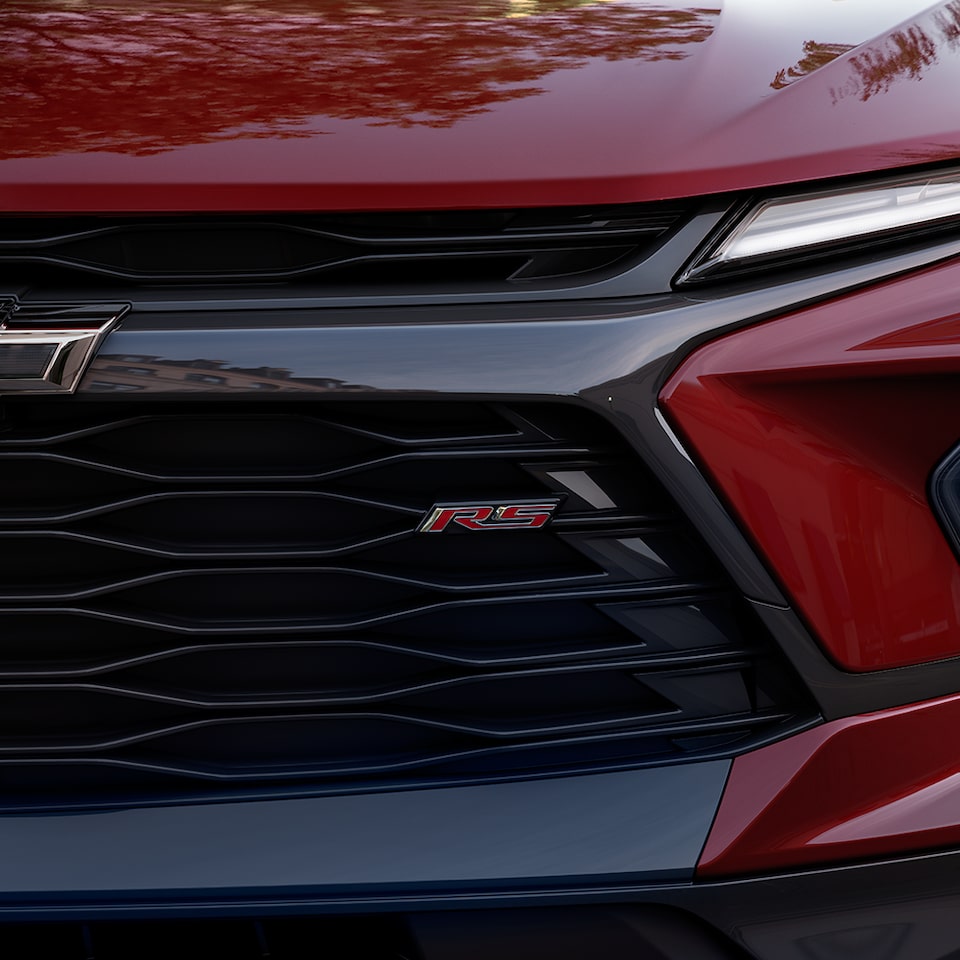 Closeup of the Grille and Front of the 2024 Chevrolet Blazer Driving Through the City