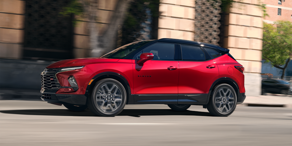 Driver side view  of a 2024 Chevrolet Blazer SUV Driving Through The City