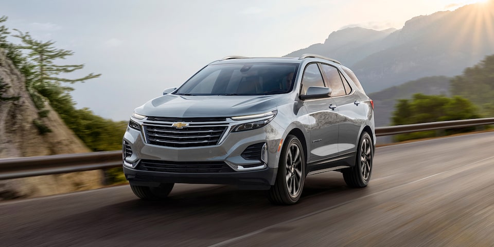 The Equinox Driving on a Beautiful Mountain Road with the Sun on the Horizon