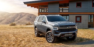 The 2024 Chevy Tahoe Parked in Front of a Modern Home