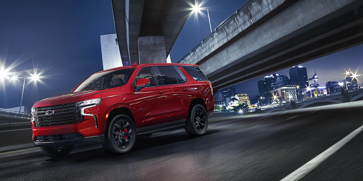 2024 Tahoe RST Performance Edition Driving Under A Bridge At Night