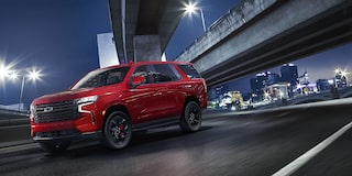 2024 Tahoe RST Performance Edition Driving Under A Bridge At Night
