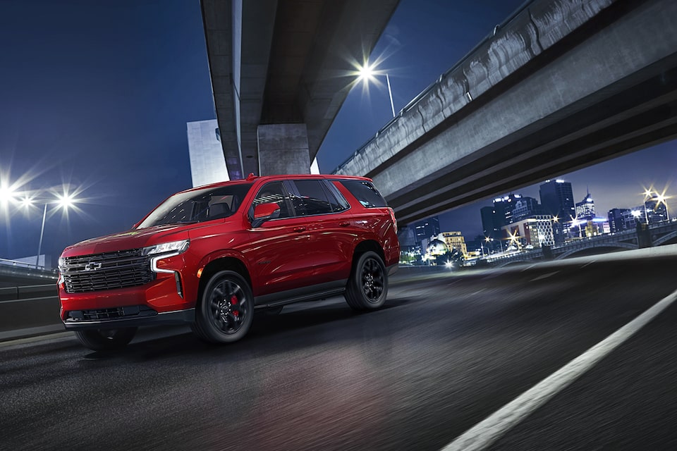 2024 Tahoe RST Performance Edition Driving Under A Bridge At Night