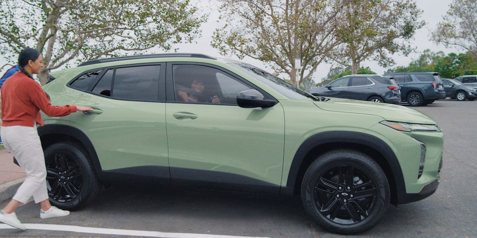 Woman Entering a  Chevy 2024 Trax Backseat