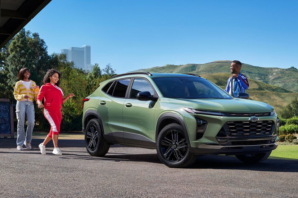 Group of Friends Approaching a 2024 Chevy Trax