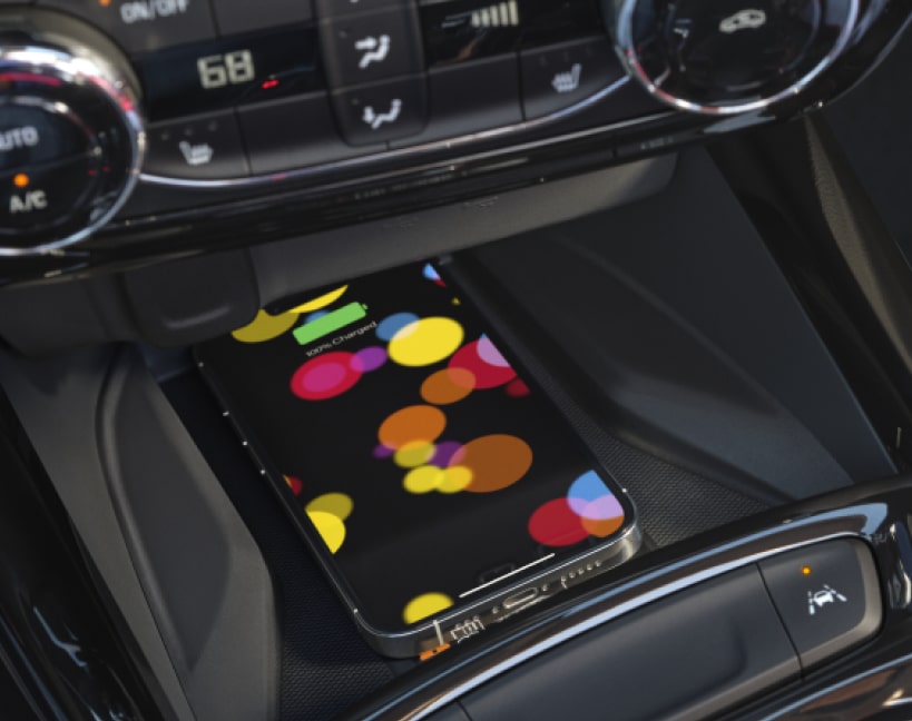 Phone on Wireless Charging area of 2025 Trax