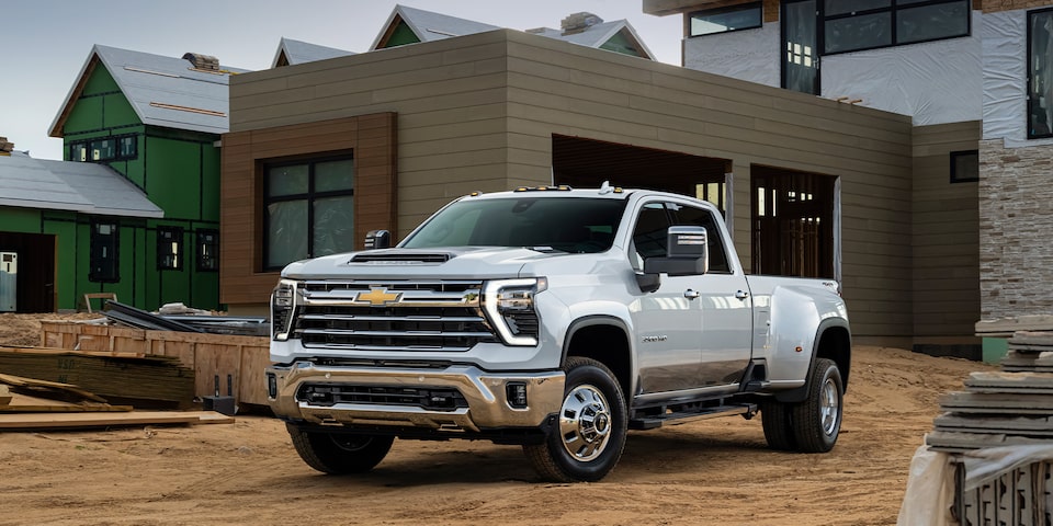 The 2024 Summit White Silverado HD Parked