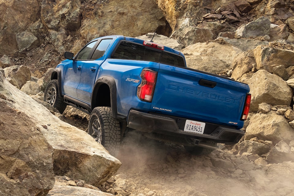 The Colorado Climbing a Steep Rocky Off-Road Trail 