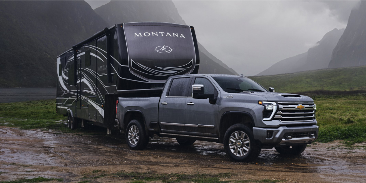 2024 Silverado HD Towing Camper on Cloudy Day