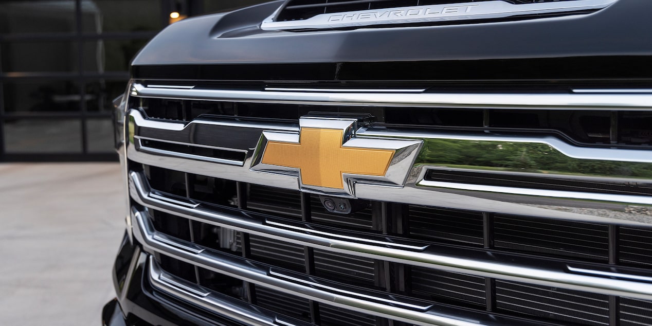 The Gold Chevrolet Bowtie and Front Grille of the 2024 Silverado HD