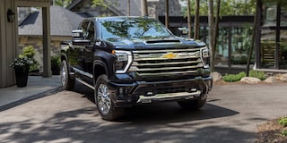 The Imposing Front End of the 2024 Silverado HD Parked in the Driveway