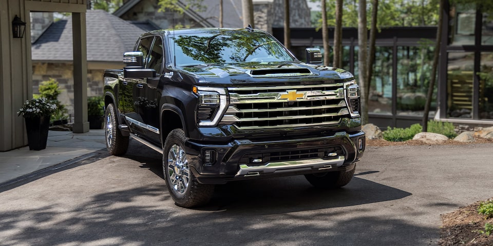 The Imposing Front End of the 2024 Silverado HD Parked in the Driveway