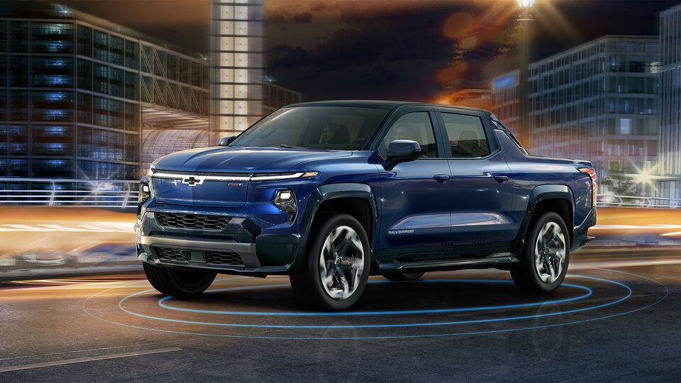 Driver's Side 3/4 of Silverado EV in City at Night