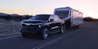 The 2024 Silverado EV Towing A Large RV Camper
