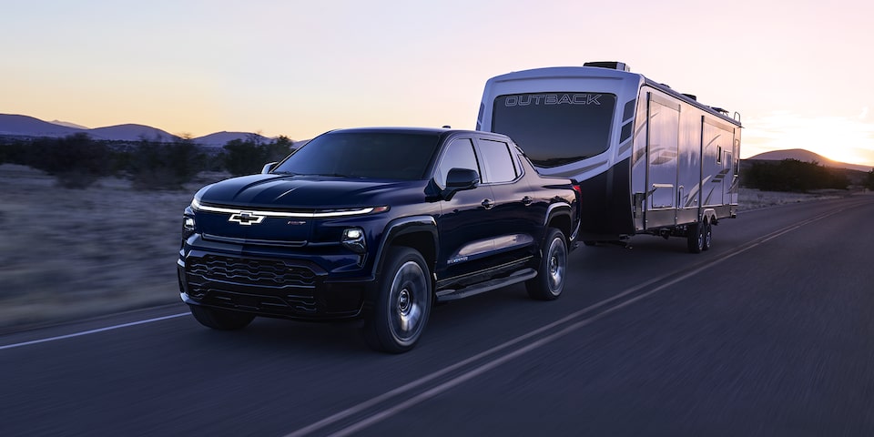 The 2024 Silverado EV Towing A Large RV Camper