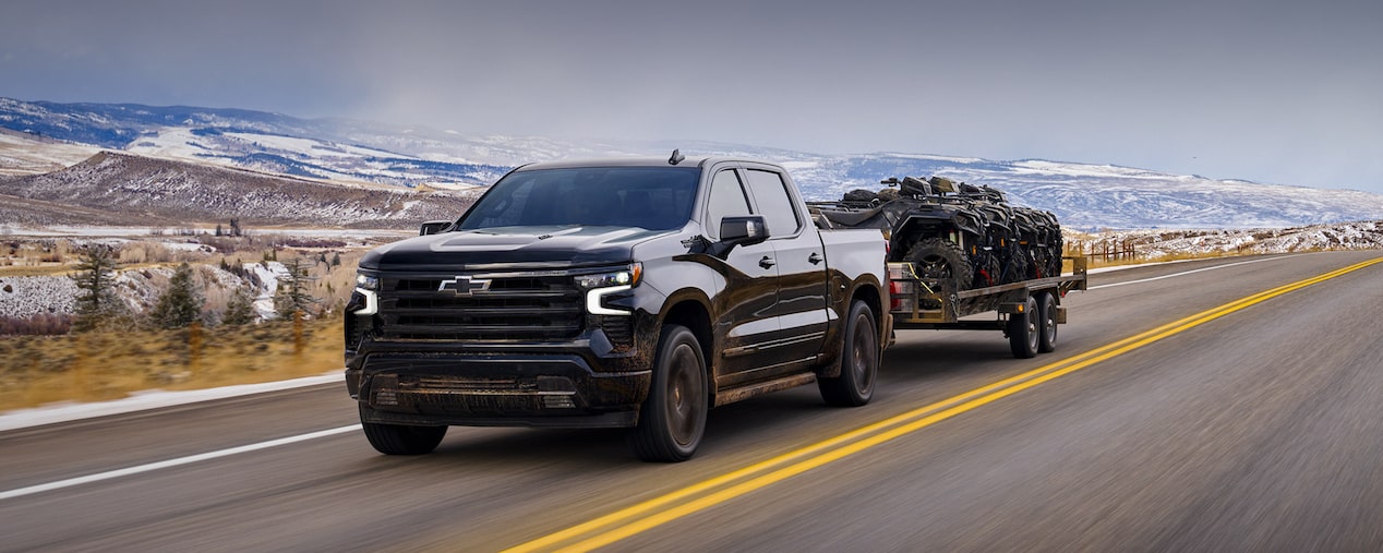 2024 Chevy Silverado Towing on Mountainside Road