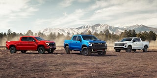 Three 2024 Chevrolet Silverado 1500 Parked Side By Side