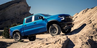 2024 Chevrolet Silverado 1500 Pickup Truck Driving Over Rough Terrain