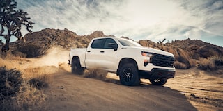 2024 Chevrolet Silverado 1500 Pickup Truck Driving Through Sand