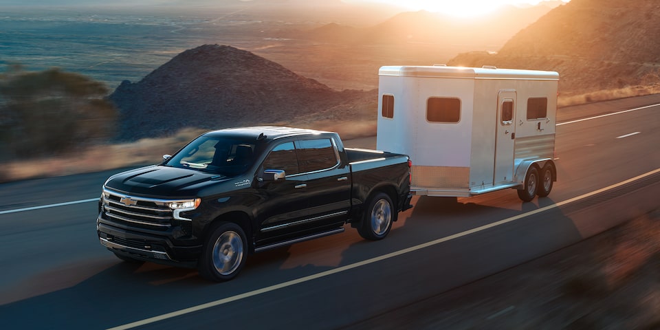 2024 Chevrolet Silverado 1500 Pickup Truck Towing a Trailer